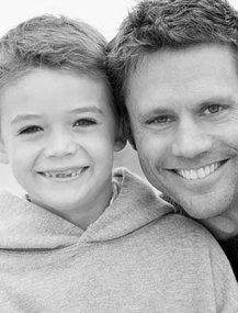 photo: two boys, one with braces